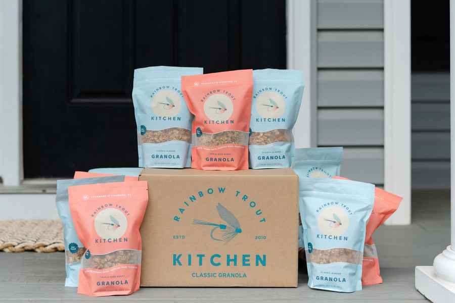A case of granola bags delivered to a front porch