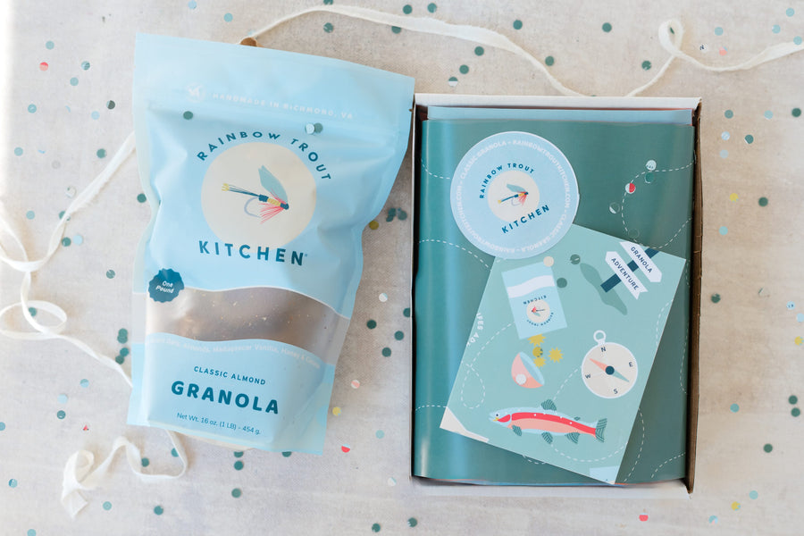Adventure gift box with a bag of Classic Almond granola and a greeting card