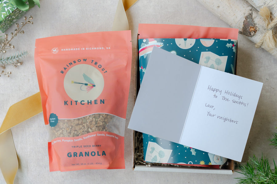 Holiday gift box with Triple Seed Berry granola and a handwritten holiday card